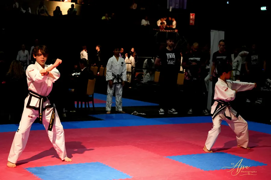 Athletes performing patterns on the mat