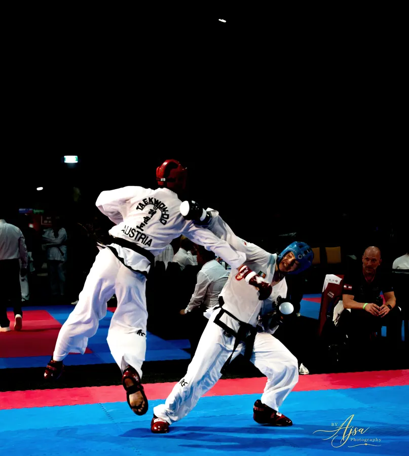 Competitor from Austria in a sparring exchange
