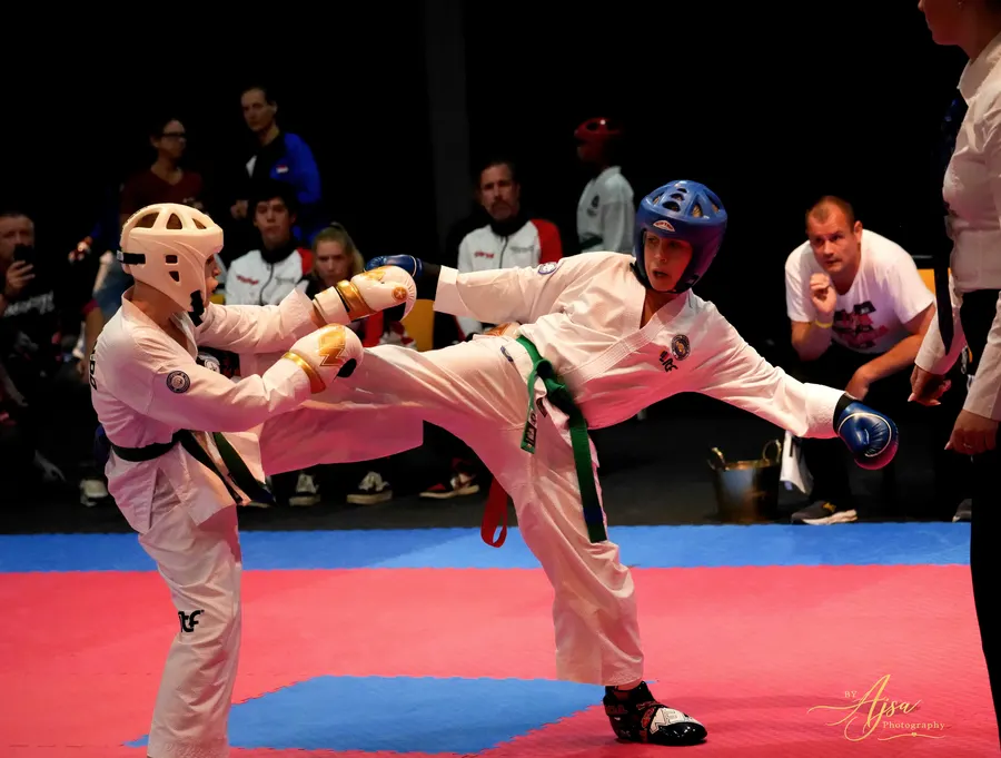 Young competitors in a kick exchange