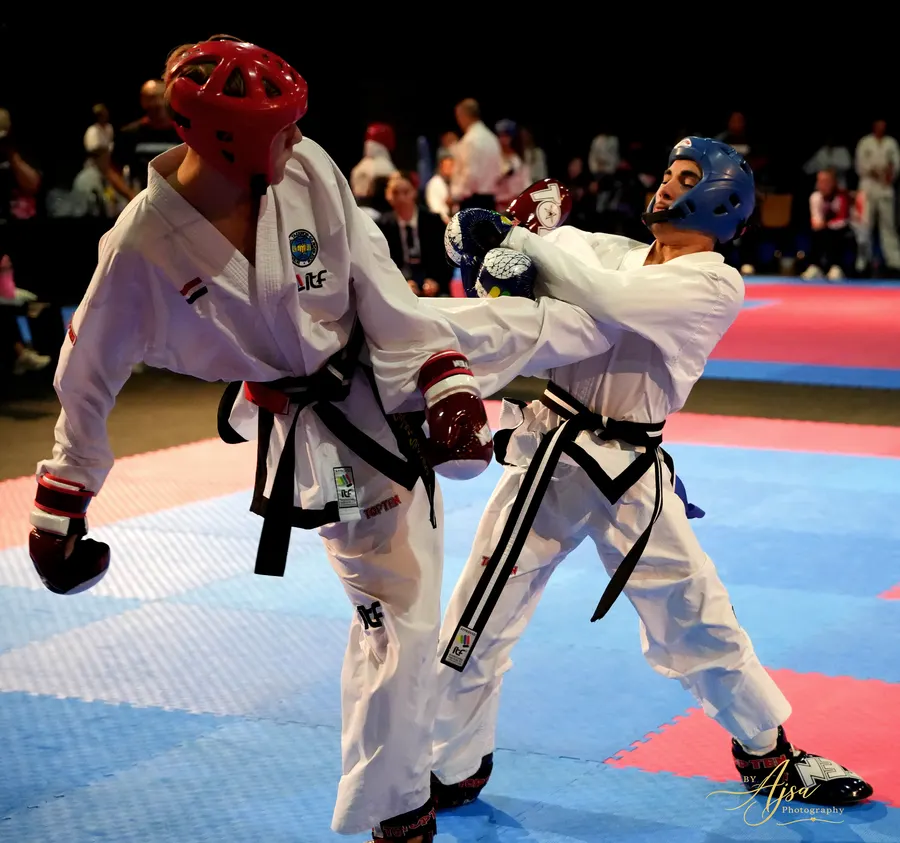 Competitors in a close sparring exchange